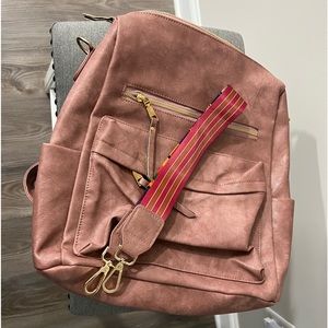 Mauve backpack with guitar strap
